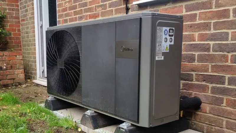 Midea r290 air source heat pump on rubber feet and purpose built base